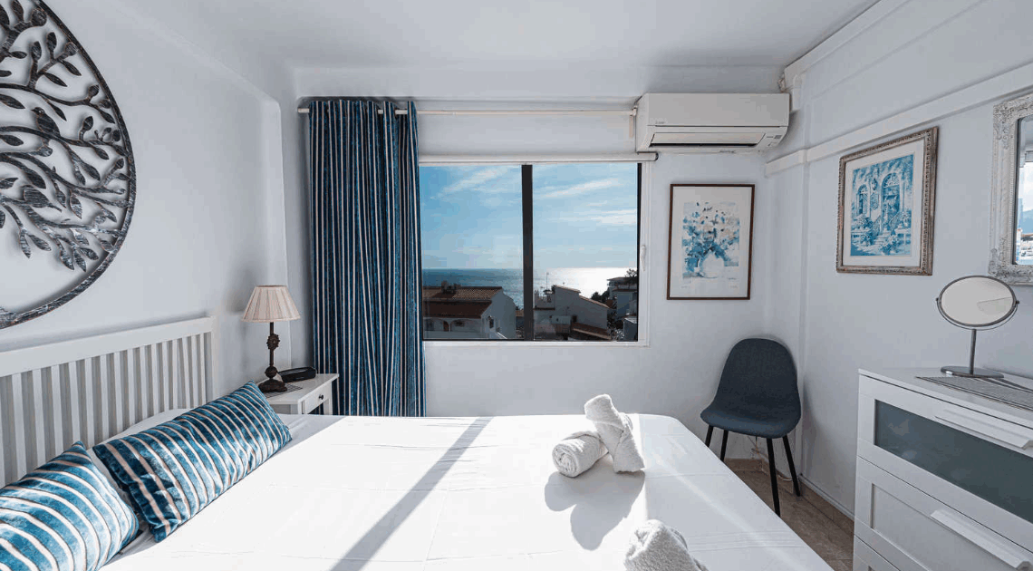 bedroom with sea views at Miami 5 Seaview apartment in Nerja