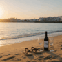Couple enjoying a romantic getaway in Nerja on a terrace overlooking the sea.